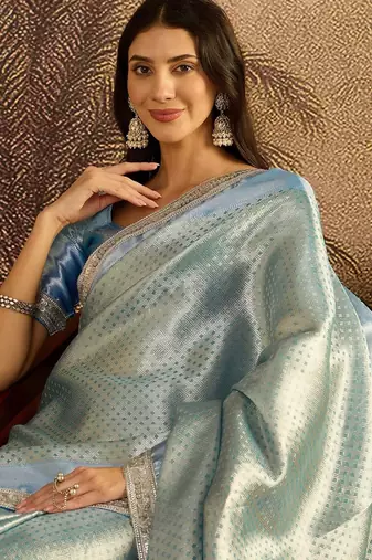 sky blue color soft banarasi tissue silk blend zari weaving & lace border saree