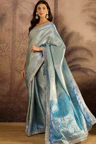 sky blue color soft banarasi tissue silk blend zari weaving & lace border saree