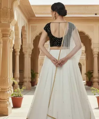 White Lehenga set with dupatta and lace detailing