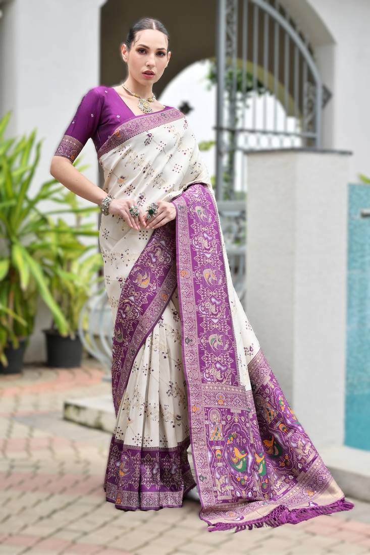 Purple banarasi silk saree in ajrakh and patola weaving with zari pallu