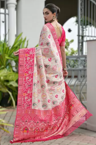Pink banarasi silk blend saree in ajrakh and patola weaving with zari pallu