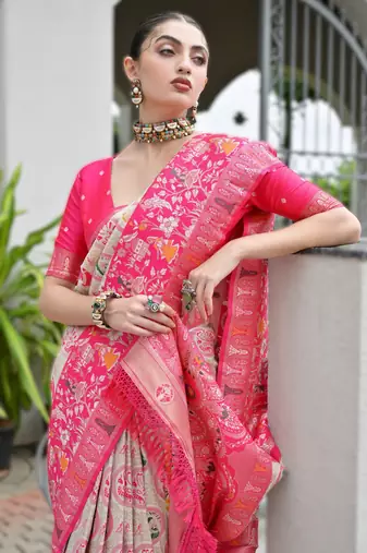 Pink banarasi silk blend saree in ajrakh and patola weaving with zari pallu