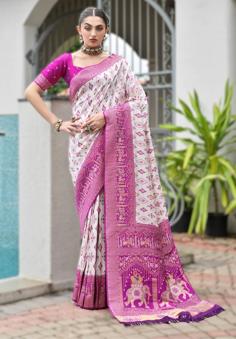 Magenta banarasi silk saree in ajrakh and patola weaving with zari pallu