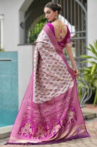 Magenta banarasi silk blend saree in ajrakh and patola weaving with zari pallu
