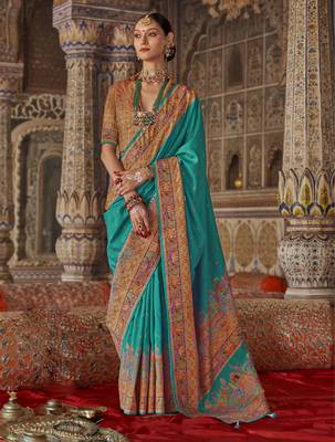 Turquoise silk blend printed saree with unstitched blouse piece 1