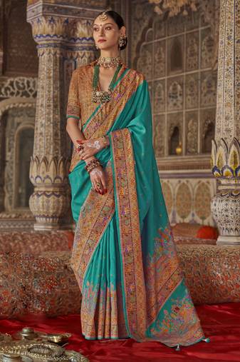 Turquoise silk printed saree with unstitched blouse piece