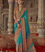 Turquoise silk printed saree with unstitched blouse piece