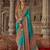 Turquoise silk printed saree with unstitched blouse piece
