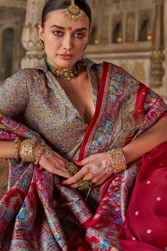 Red silk blend printed saree with unstitched blouse piece