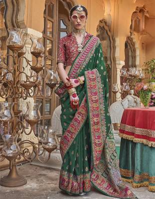 Dark green silk blend printed saree with unstitched blouse piece 1