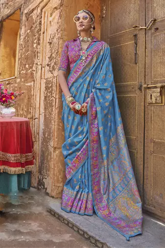 Blue silk printed saree with unstitched blouse piece