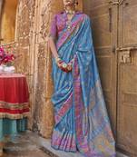 Blue silk printed saree with unstitched blouse piece