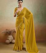 Mustard georgette embellished saree with unstitched blouse piece