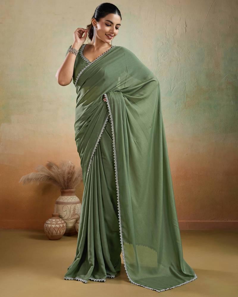 Olive georgette embellished saree with unstitched blouse piece