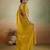 Mustard georgette embellished saree with unstitched blouse piece
