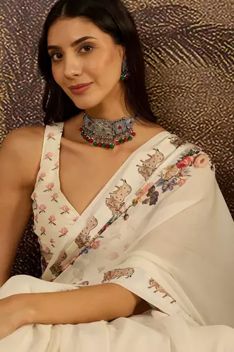 Cream georgette printed saree with unstitched blouse piece