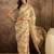 Beige silk cotton printed saree with unstitched blouse piece