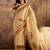 Beige silk cotton printed saree with unstitched blouse piece