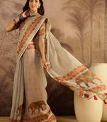 Cream silk cotton printed saree with unstitched blouse piece
