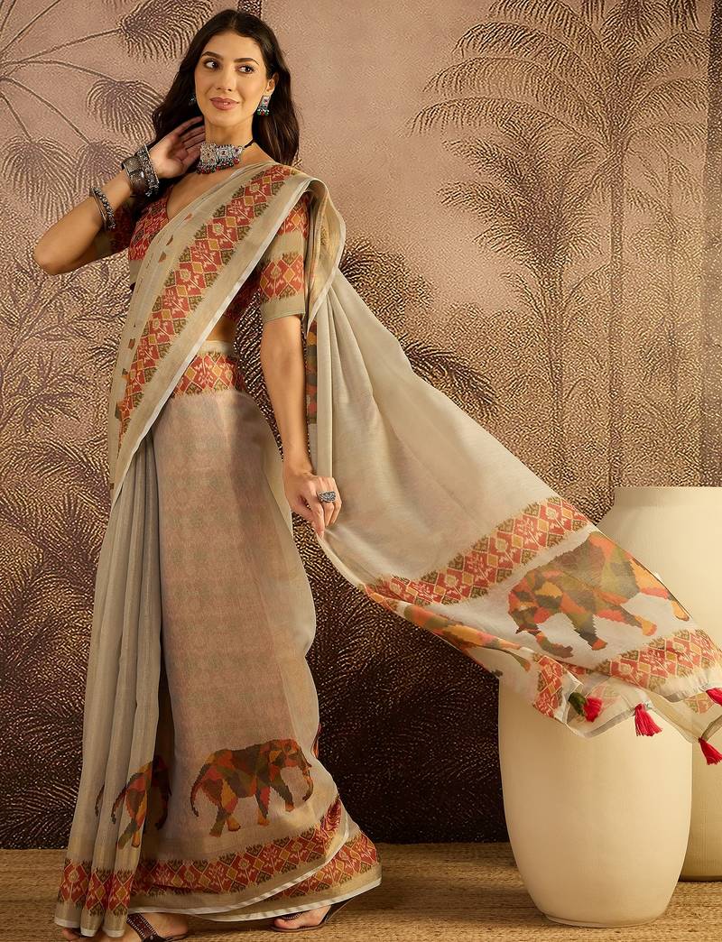 Cream silk cotton printed saree with unstitched blouse piece