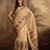Beige silk cotton printed saree with unstitched blouse piece