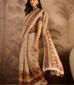 Beige silk cotton printed saree with unstitched blouse piece