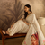 Cream cotton printed saree with unstitched blouse piece