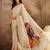 Cream cotton printed saree with unstitched blouse piece