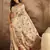 Cream tussar silk printed saree with unstitched blouse piece