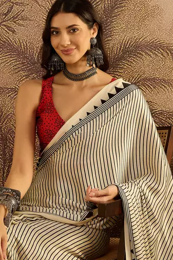Off white satin printed saree with unstitched blouse piece