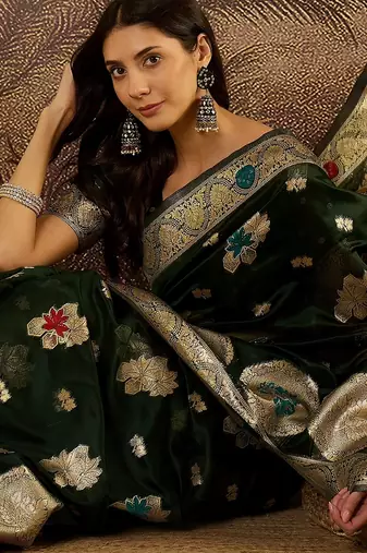 Bottle green organza zari woven saree with unstitched blouse piece