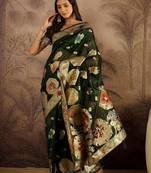 Bottle green organza zari woven saree with unstitched blouse piece