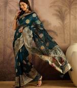 Teal organza zari woven saree with unstitched blouse piece