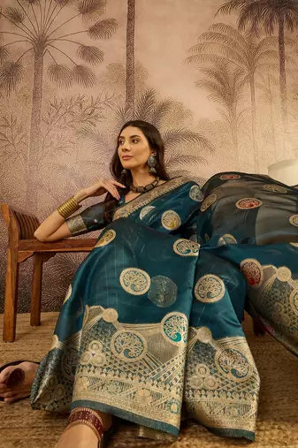 Teal organza zari woven saree with unstitched blouse piece