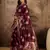 Wine organza zari woven saree with unstitched blouse piece