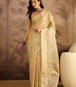 Beige super net embroidered saree with unstitched blouse piece