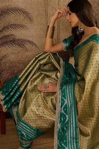 green silk blend blend zari saree with unstitched blouse piece
