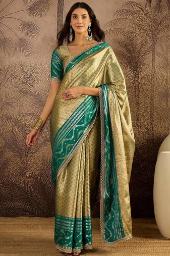 green silk blend blend zari saree with unstitched blouse piece
