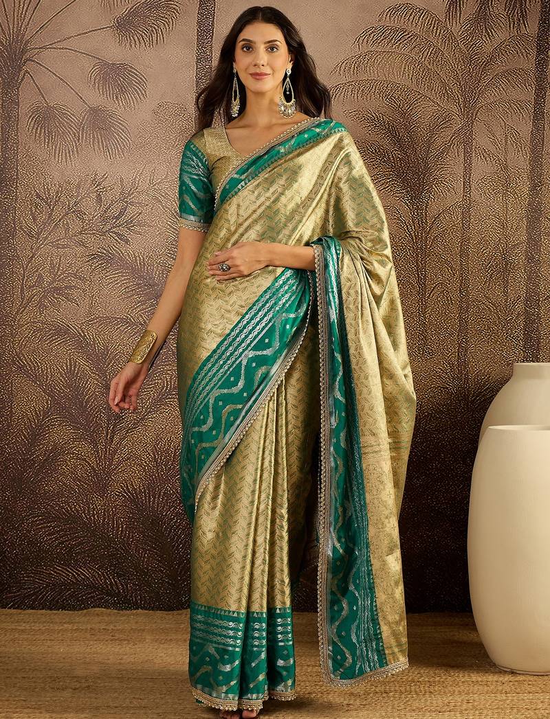 green silk blend blend zari saree with unstitched blouse piece