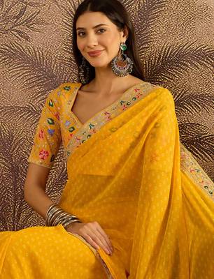 Georgette yellow bandhni saree with unstitched blouse piece 2