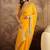 Georgette yellow bandhni saree with unstitched blouse piece