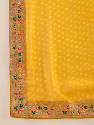 Georgette yellow bandhni saree with unstitched blouse piece 5