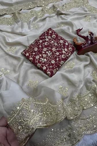 white soft rangoli silk saree with embroidery work