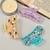 Set of 3 multicolor marble print hair claw clutcher