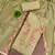 Olive cotton silk embroidered unstitched dress material