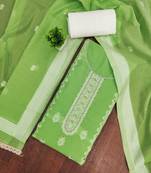 Green cotton silk embellished unstitched dress material