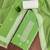 Green cotton silk embellished unstitched dress material