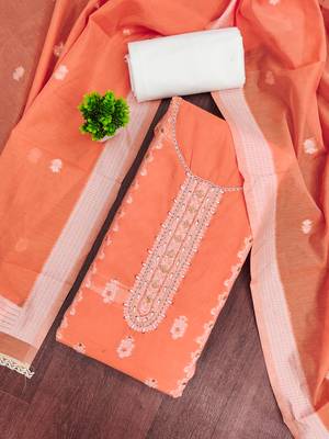 Orange cotton silk embellished unstitched dress material 1