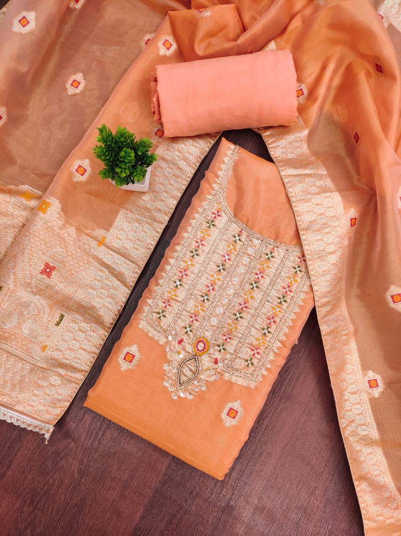 Orange shimmer banarasi woven unstitched dress material