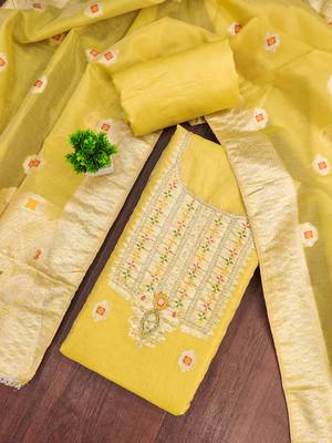 Yellow shimmer banarasi woven unstitched dress material 1